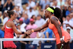 Roberta Vinci shakes hands with Serena Williams after pulling off the most unlikely upset.