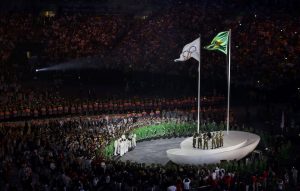 The Olympic flag is risen during the opening ceremony [Photo: Reuters/Mike Blake]