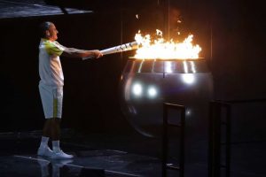 Olympian Vanderlei de Lima lights the Olympic cauldron